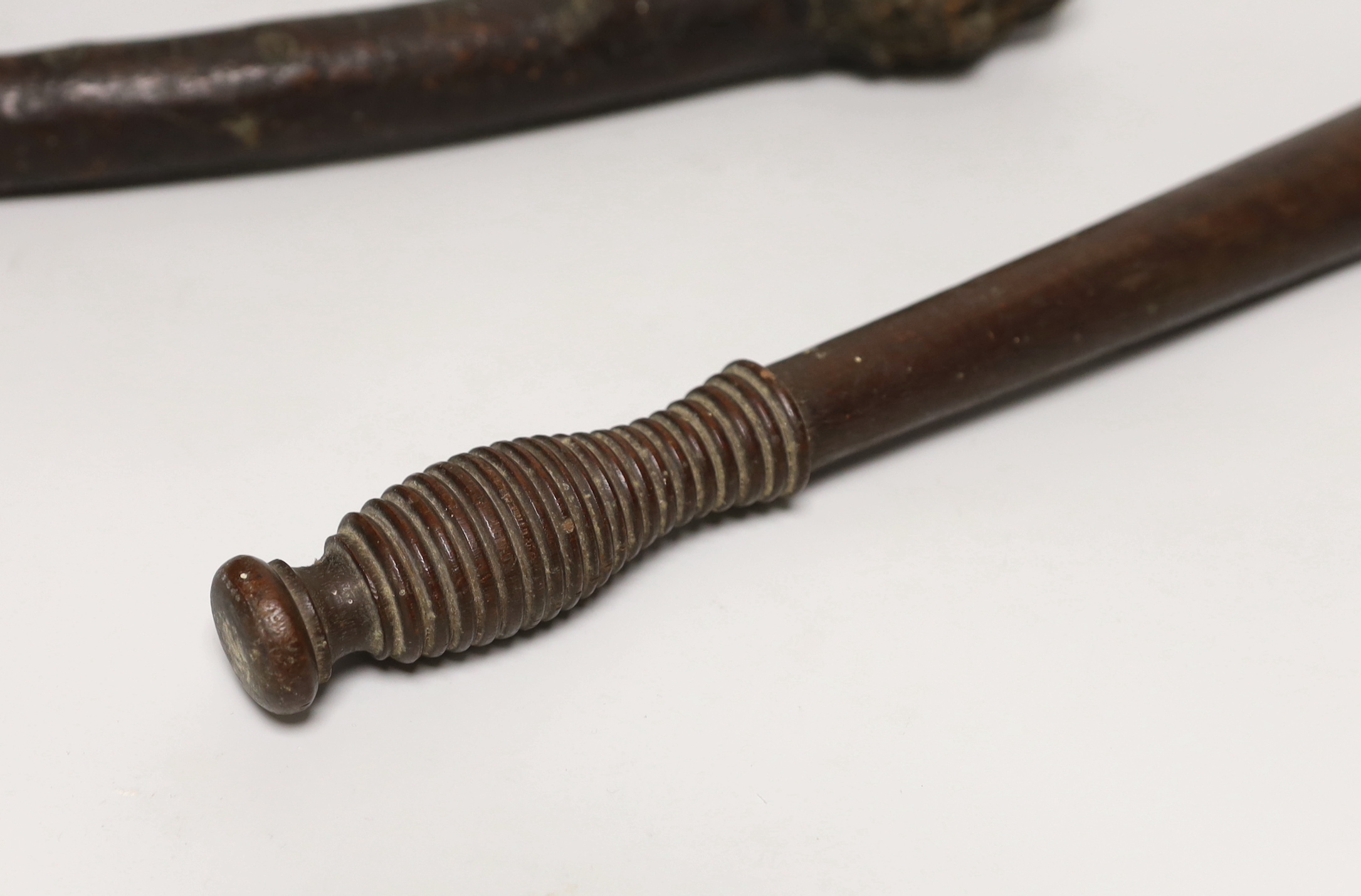 A truncheon with turned handle and a hardwood knobkerrie, the largest 47cm in length
